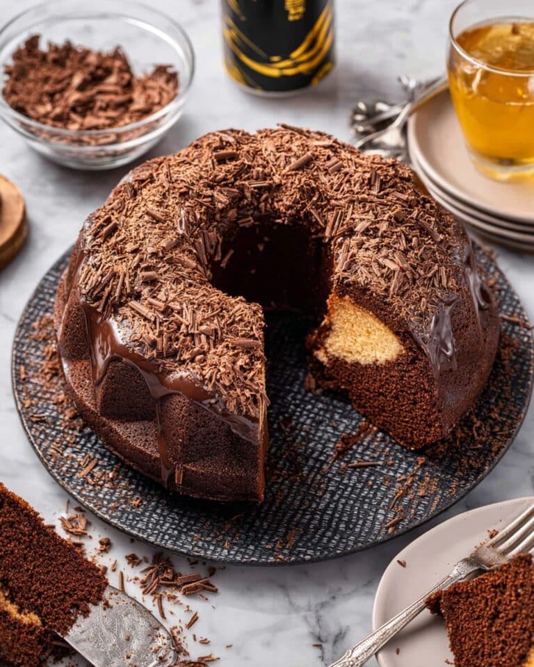Guinness Chocolate Cake with Irish Cream Cheesecake Filling and Whiskey Irish Cream Chocolate Glaze Recipe