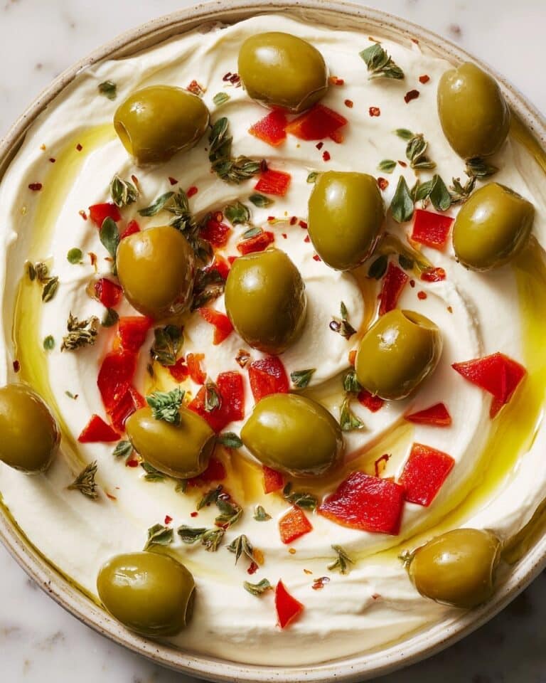 Whipped Ricotta with Olives, Roasted Red Peppers, and Infused Herb Oil Recipe